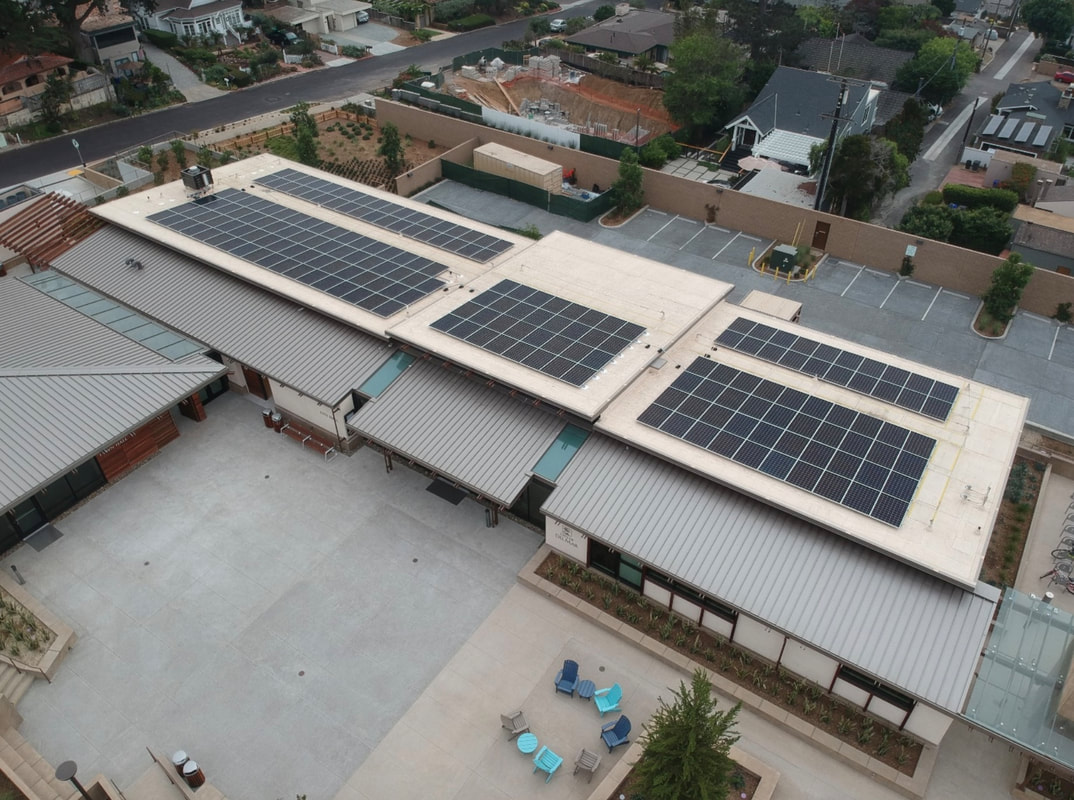 Aerial view of rooftop solar photovoltaic arrays on the City of Del Mar Civic Center